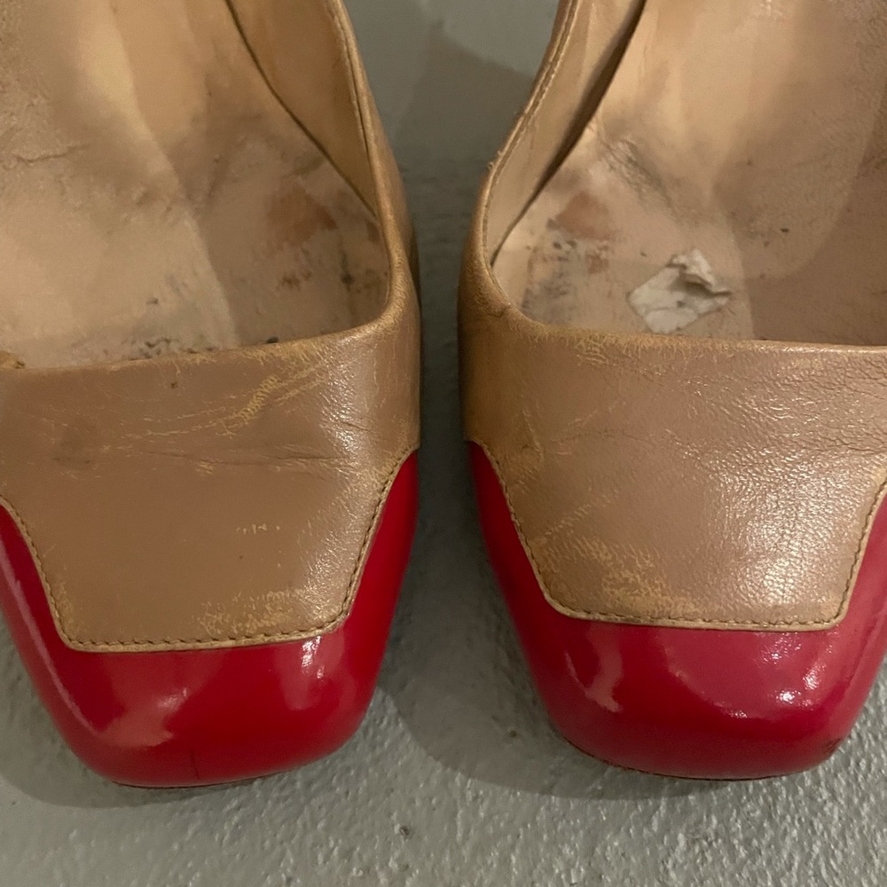 Well loved and well worn louboutins.